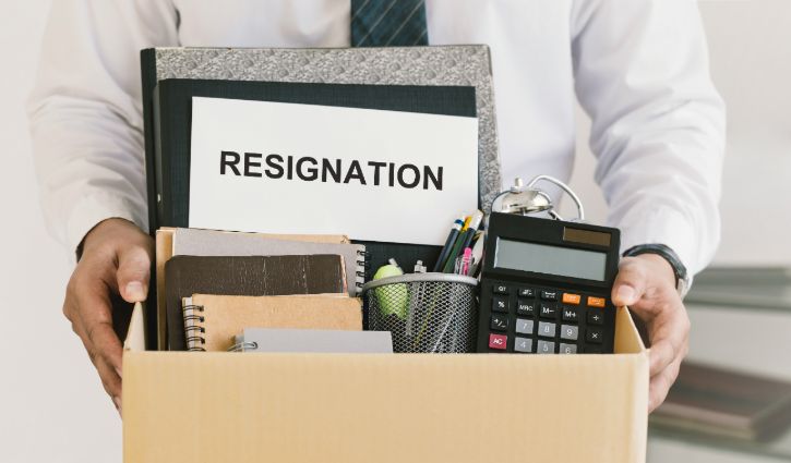 Resignation. businessmen holding boxes for personal belongings and resignation letters.Quitting a job,The big quit.The great Resignation.