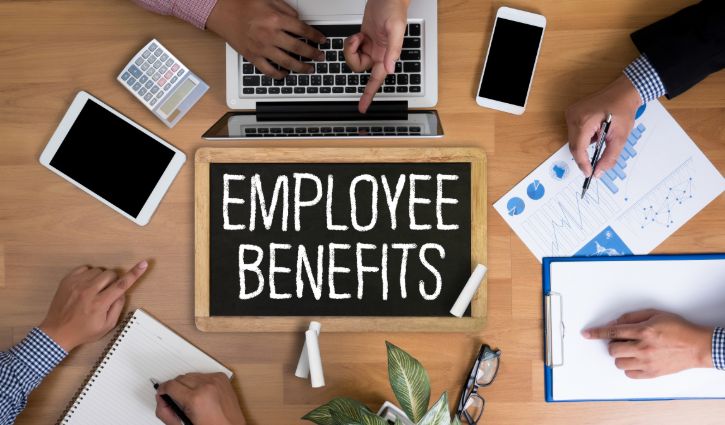 Employee Benefits Man working on tablet technology communication