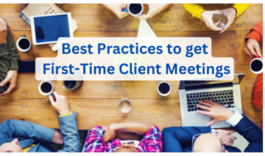 A group of people sit around a wooden table with coffee cups, a laptop, and a tablet. The text overlay reads Best Practices for First-Time Client Meetings, highlighting the focus on effective strategies in business teamwork.